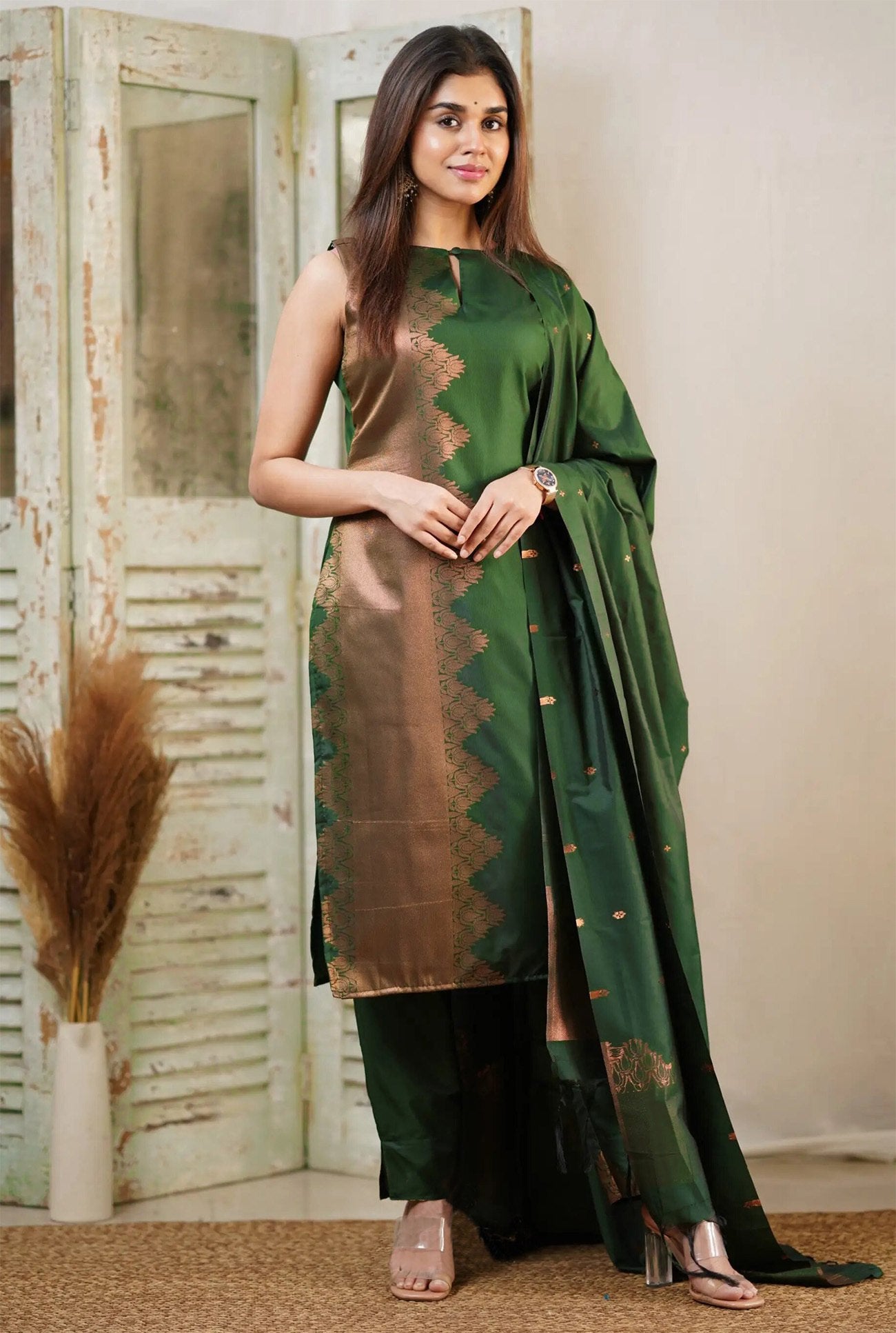 Art Silk Sleeveless Kurta Set in Dark Green with Copper Zari Work