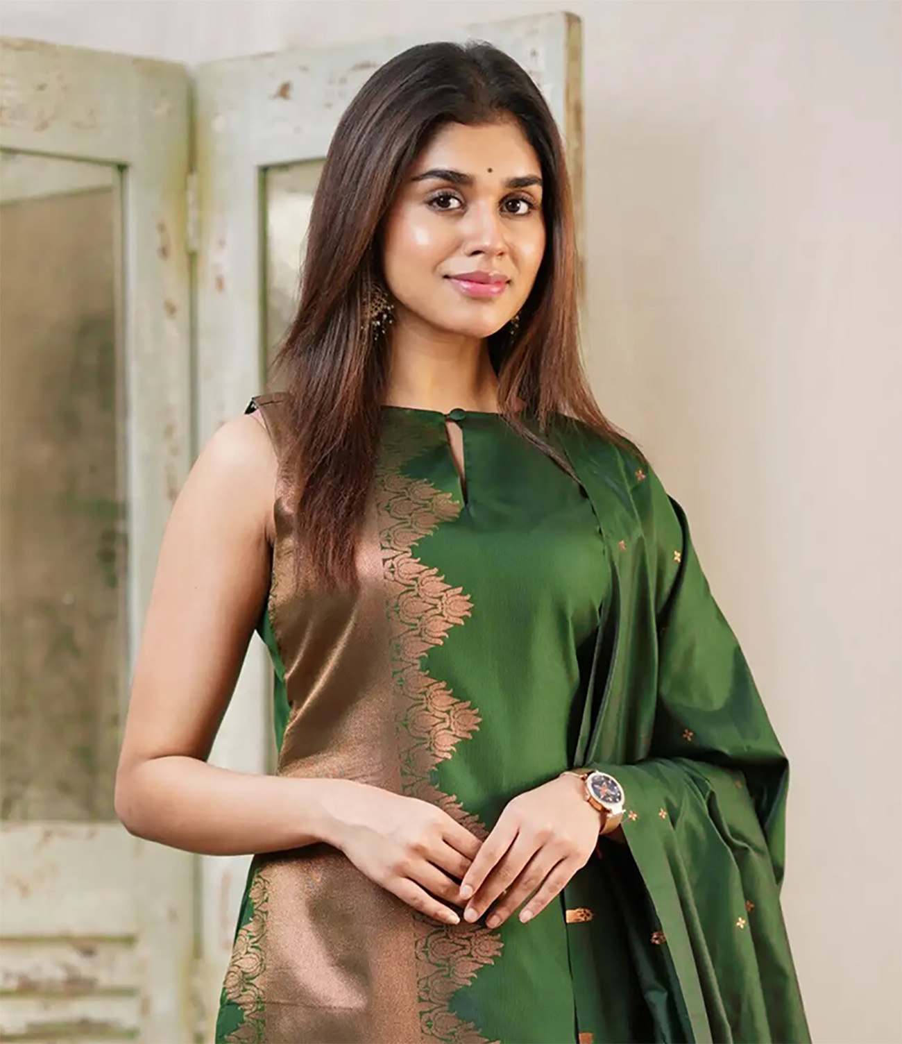 Art Silk Sleeveless Kurta Set in Dark Green with Copper Zari Work