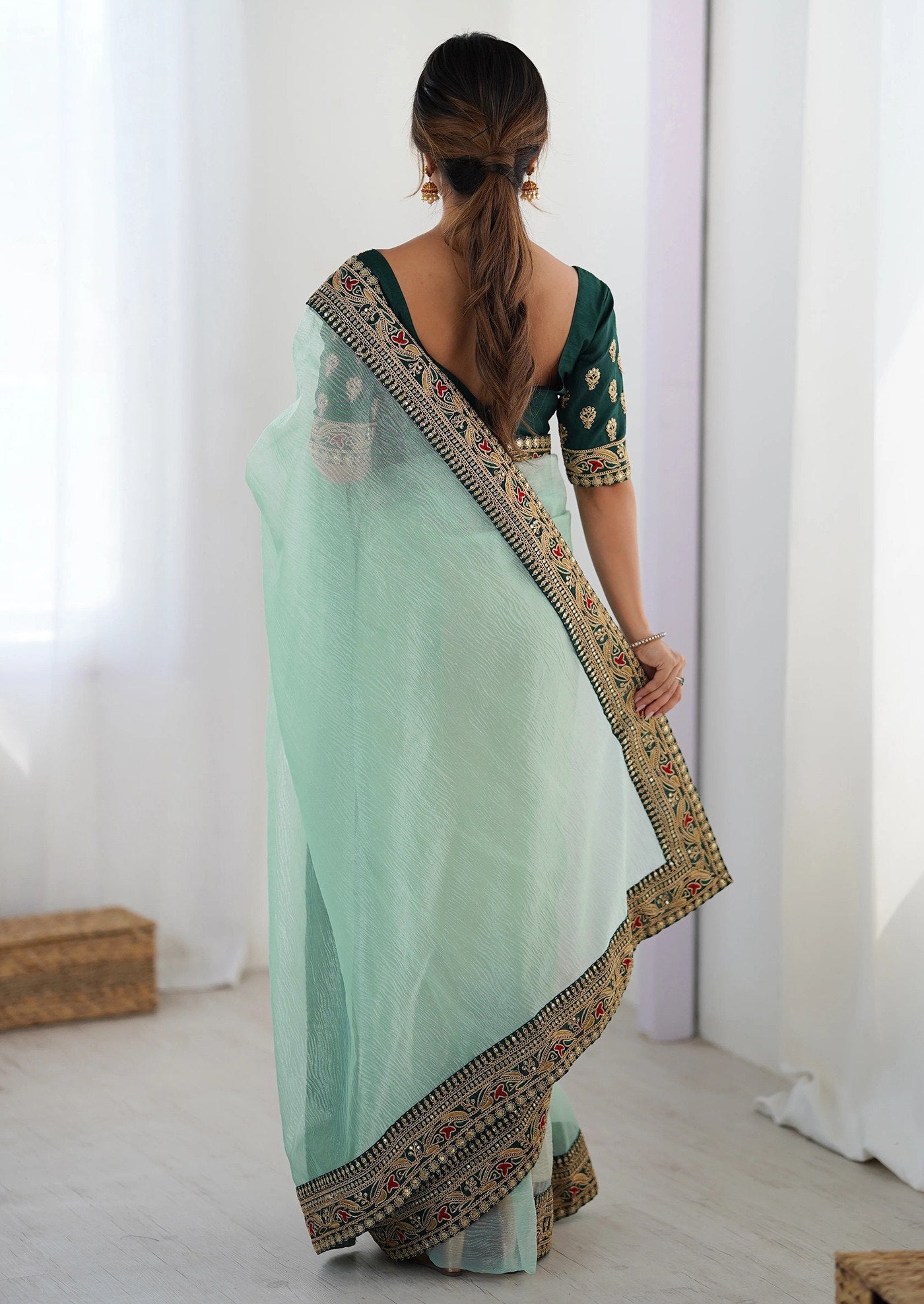 Torquoise Net Saree with Bottle Green Embroidered Silk Blouse & Scalloped Border
