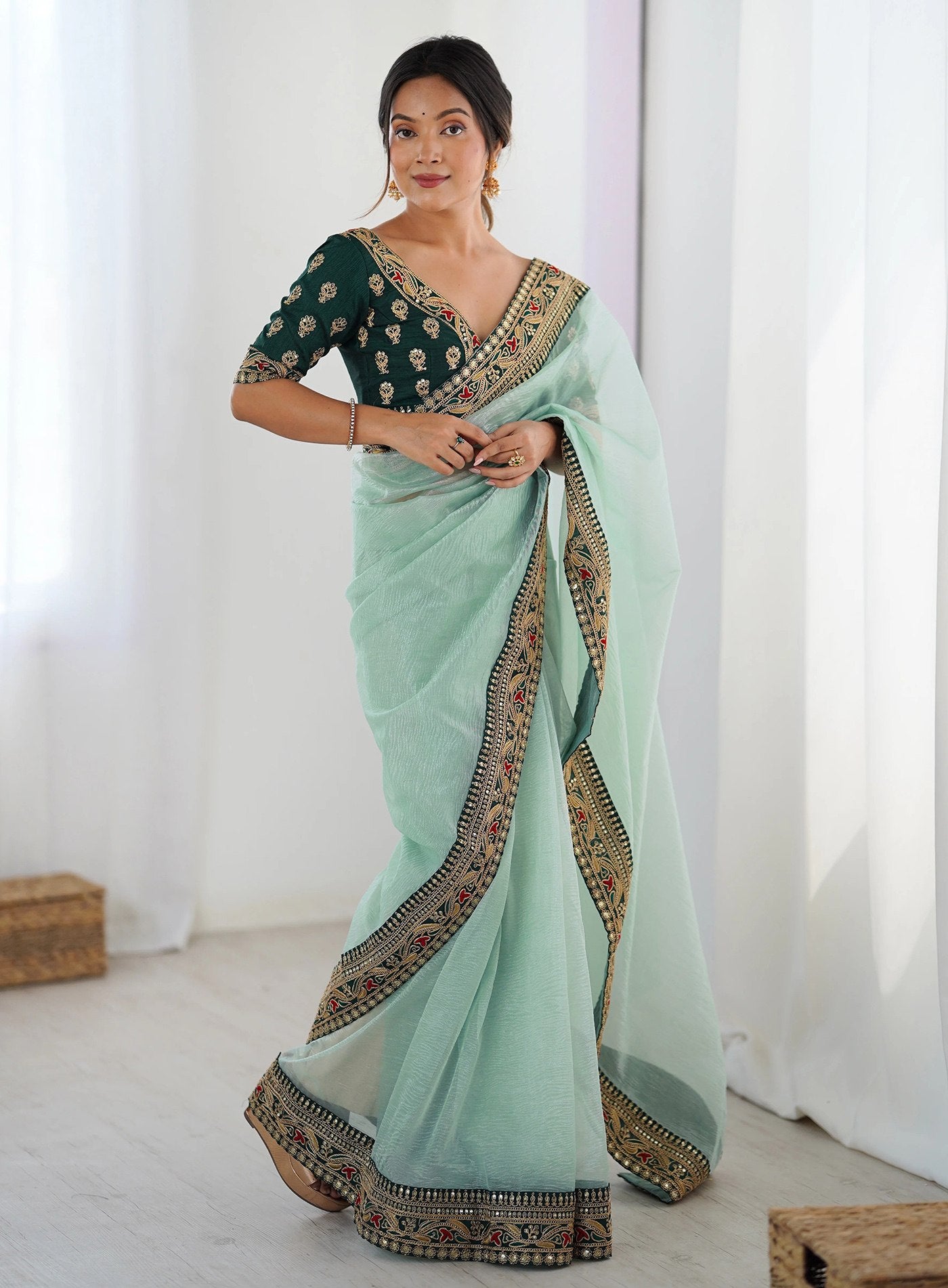 Torquoise Net Saree with Bottle Green Embroidered Silk Blouse & Scalloped Border