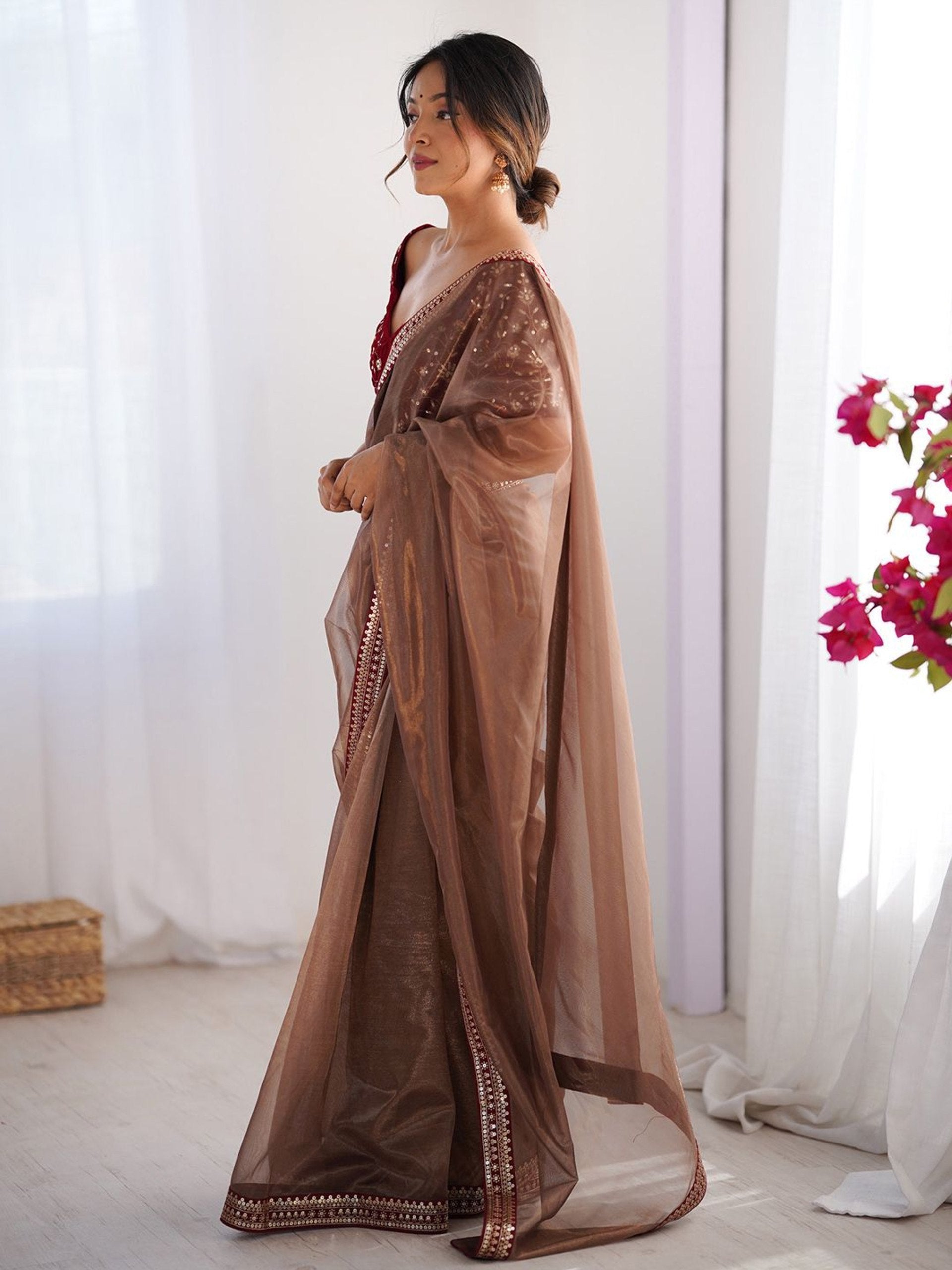 Shimmer Net Saree with Heavily Embroidered Velvet Blouse