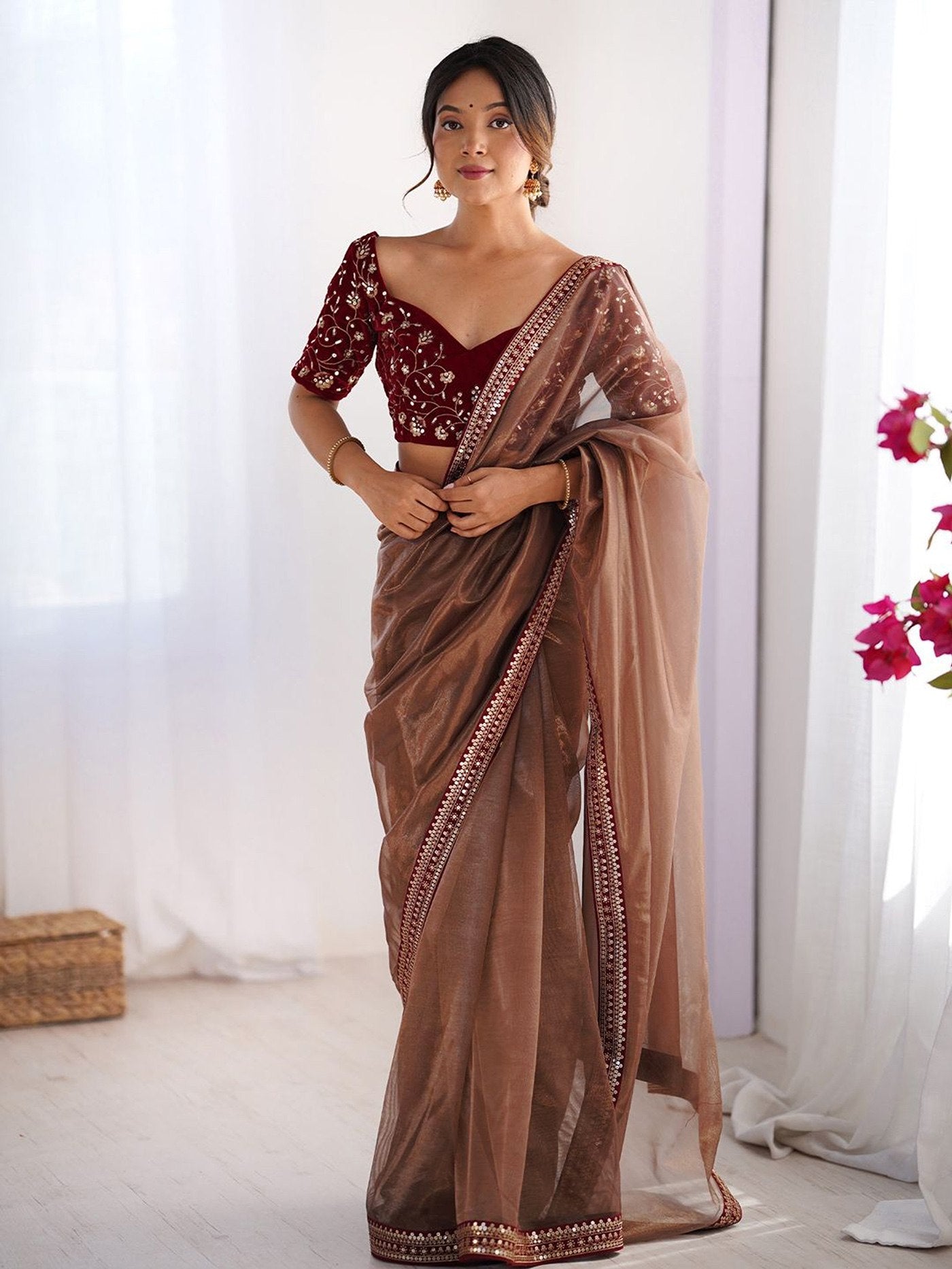 Shimmer Net Saree with Heavily Embroidered Velvet Blouse