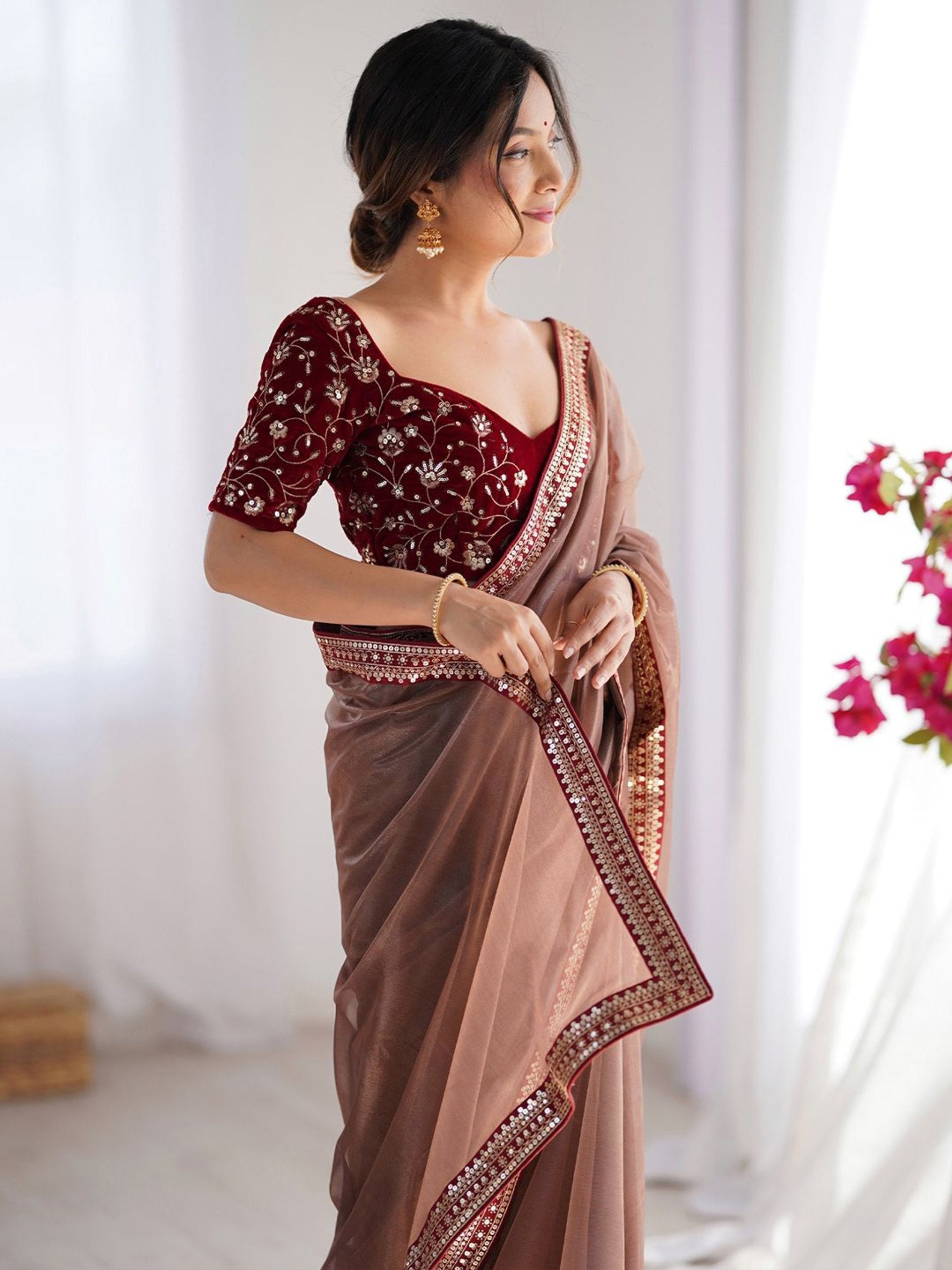 Shimmer Net Saree with Heavily Embroidered Velvet Blouse