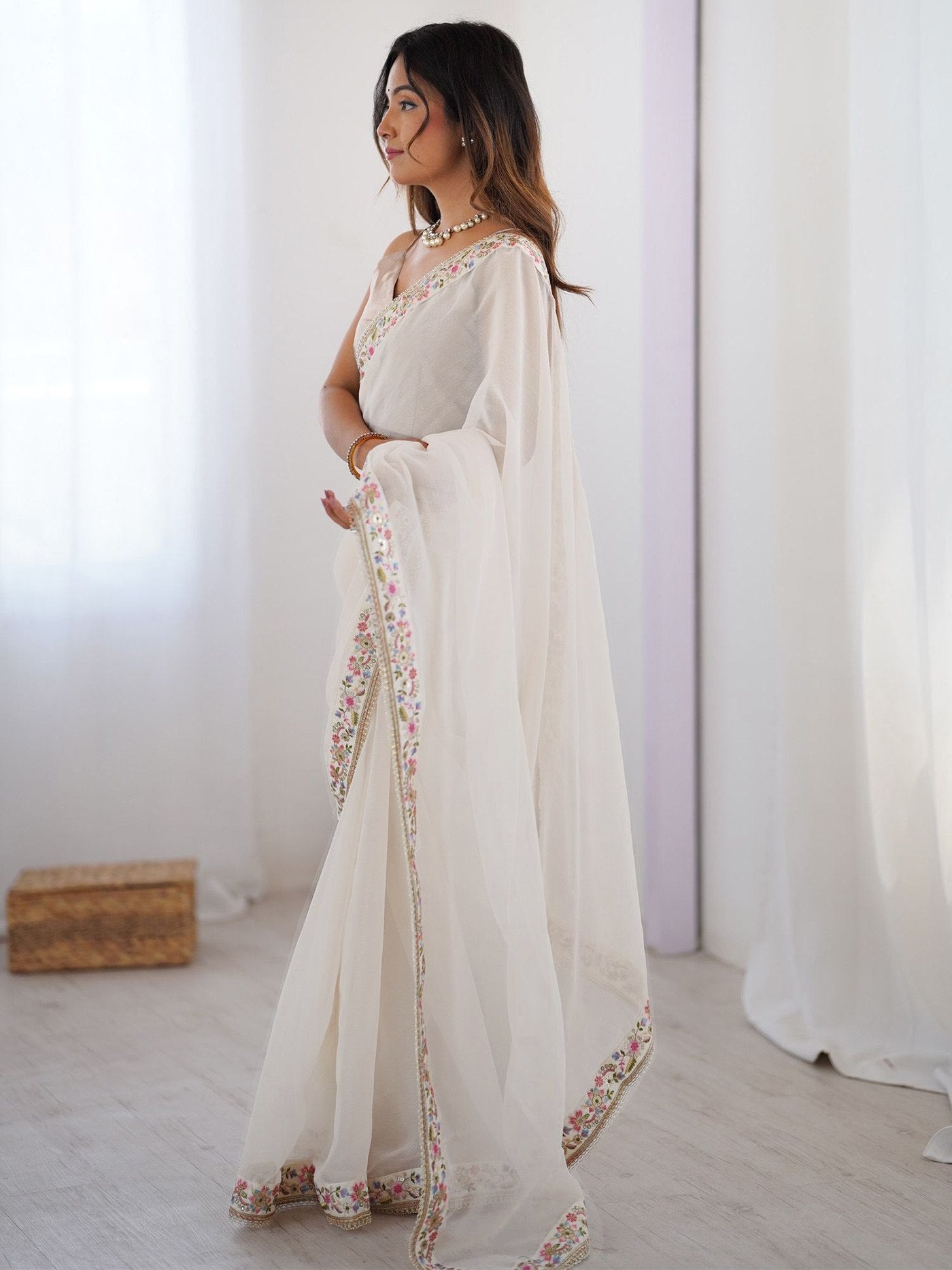 Elegant Off-White Georgette Saree with Floral Scalloped Border & Champagne Art Silk Blouse