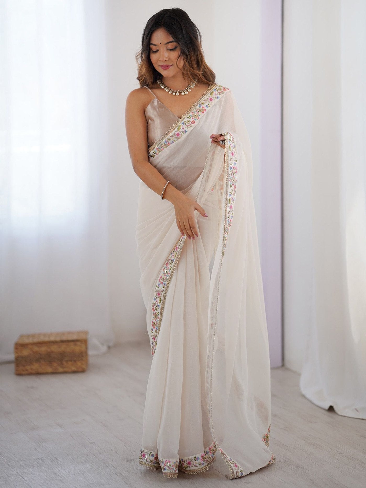 Elegant Off-White Georgette Saree with Floral Scalloped Border & Champagne Art Silk Blouse