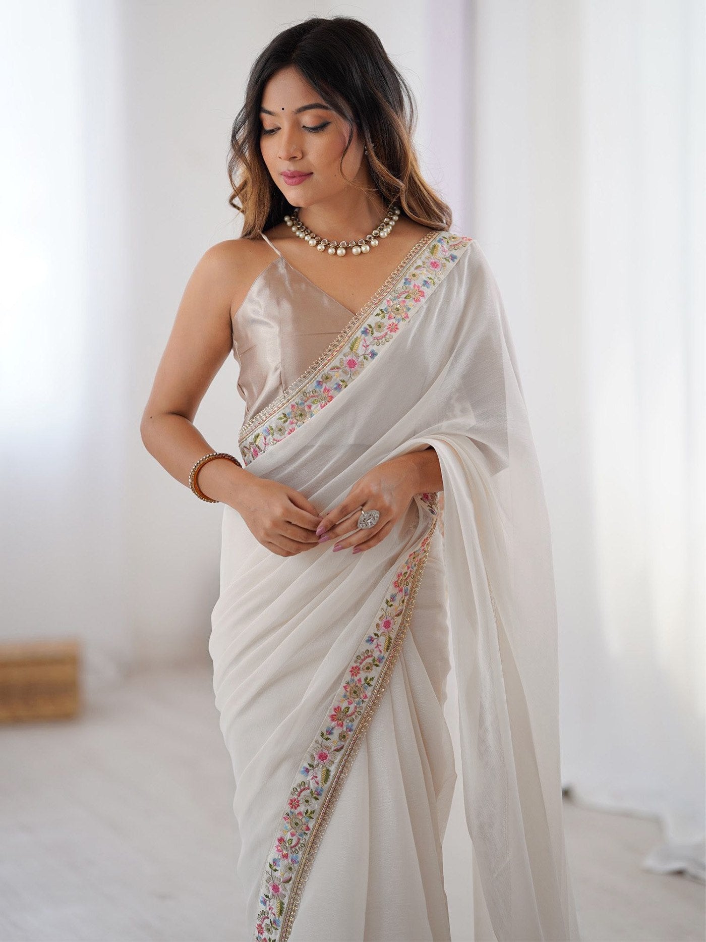 Elegant Off-White Georgette Saree with Floral Scalloped Border & Champagne Art Silk Blouse