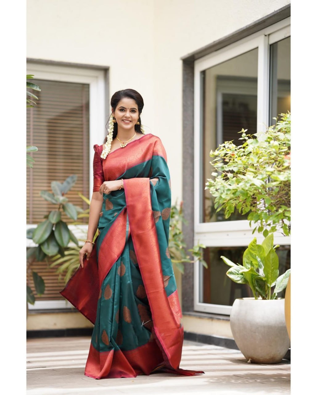 Exquisite Teal Banarasi Silk Saree with Rust Traditional Border