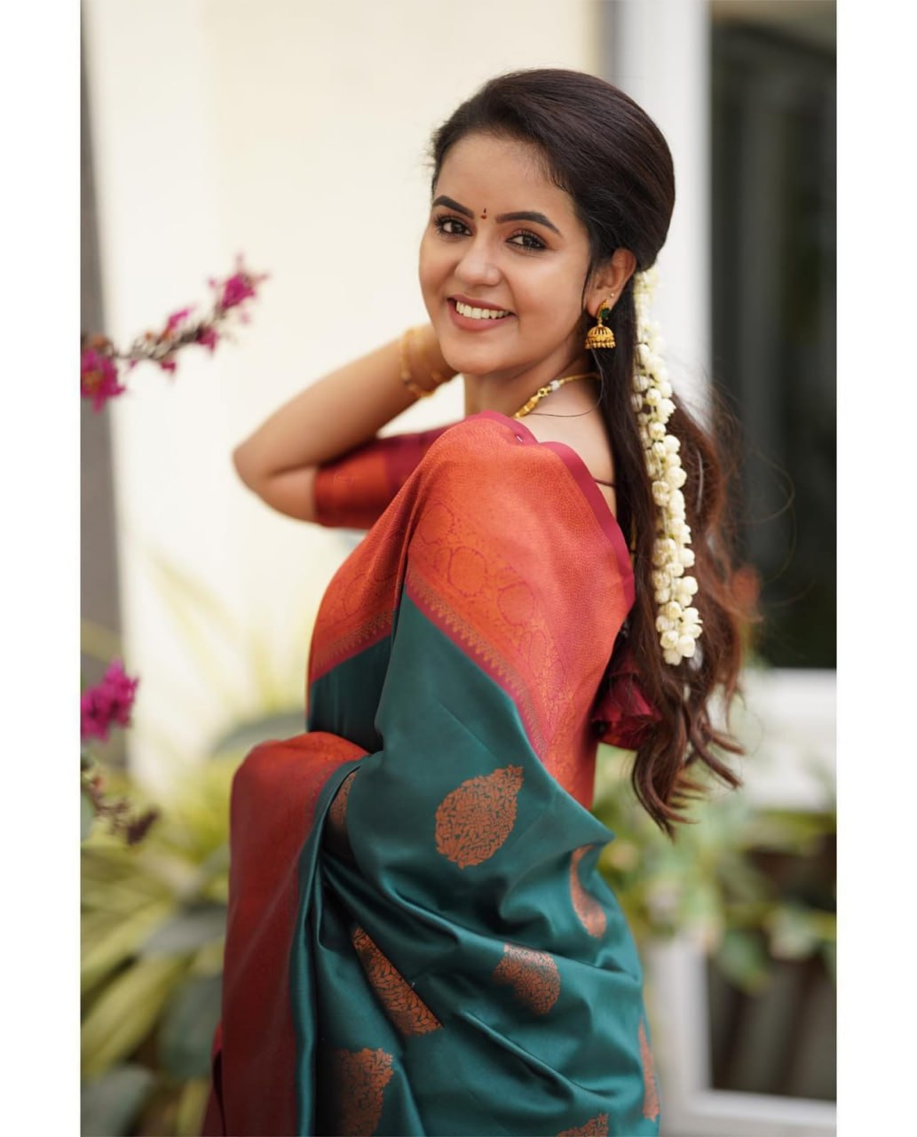 Exquisite Teal Banarasi Silk Saree with Rust Traditional Border