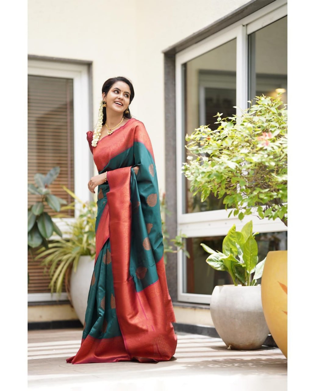 Exquisite Teal Banarasi Silk Saree with Rust Traditional Border