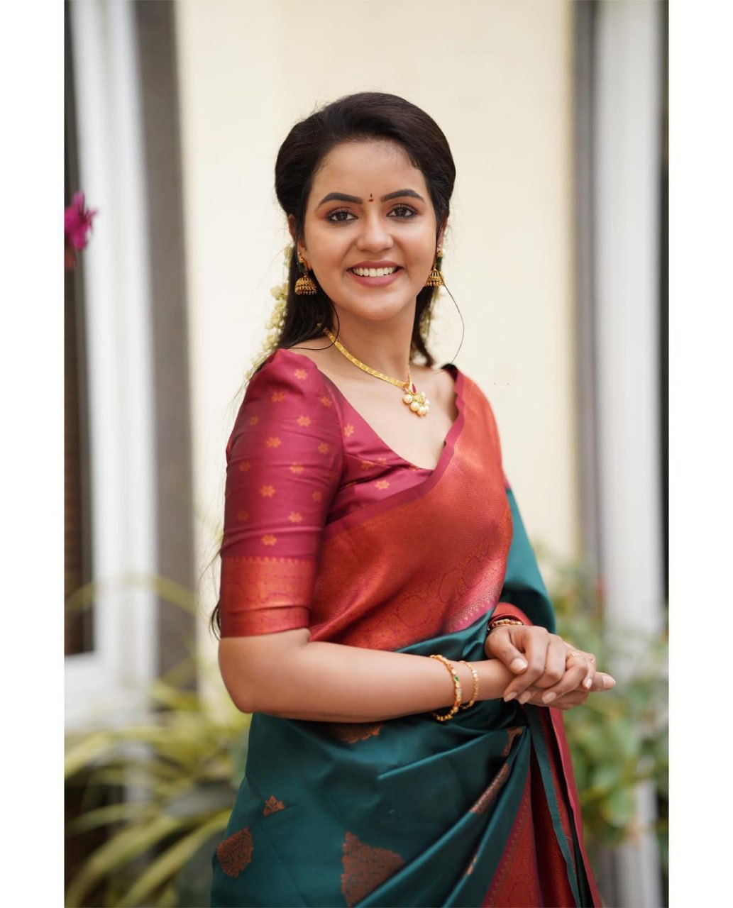 Exquisite Teal Banarasi Silk Saree with Rust Traditional Border