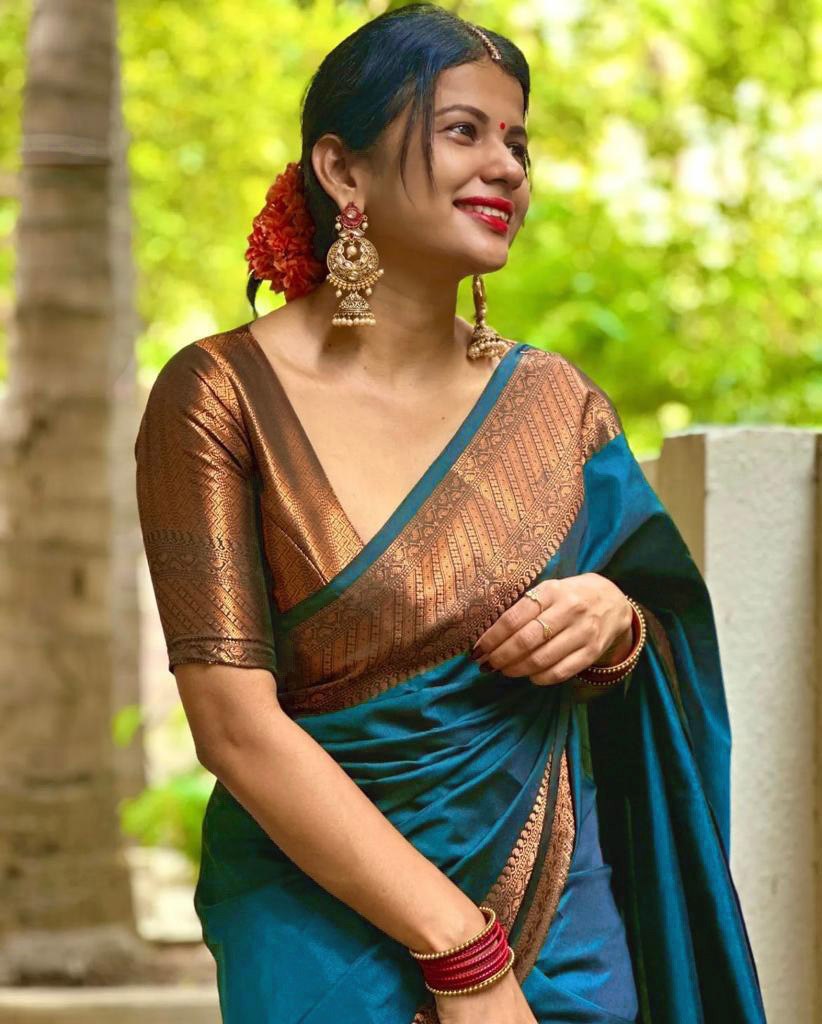 Exquisite Teal Blue Banarasi Silk Saree with Antique Copper Zari Border