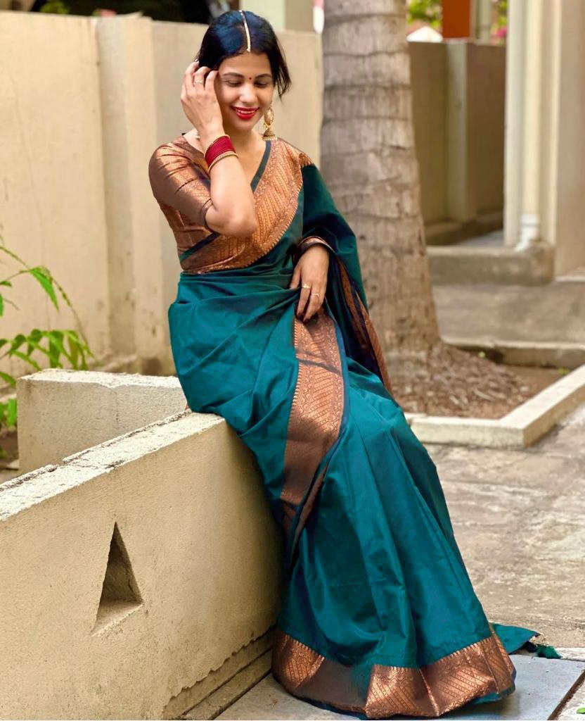 Exquisite Teal Blue Banarasi Silk Saree with Antique Copper Zari Border