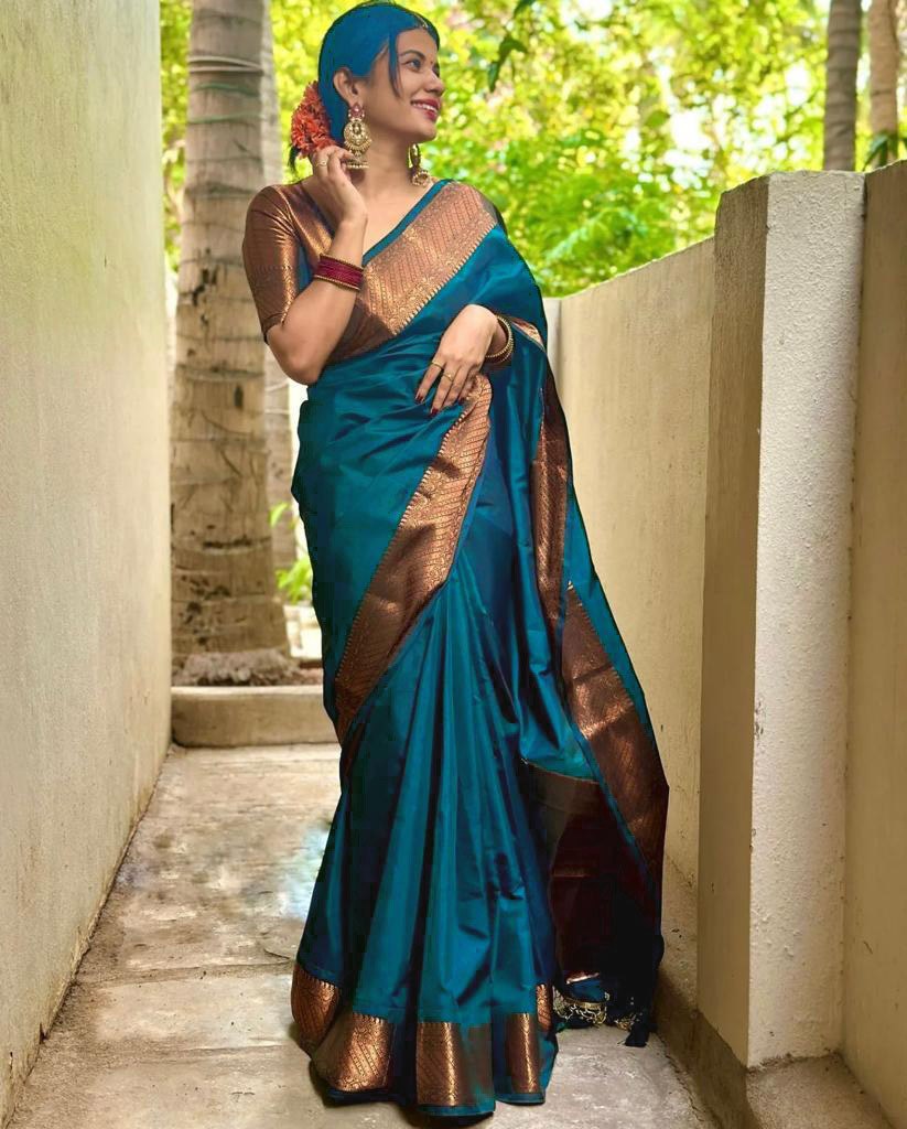 Exquisite Teal Blue Banarasi Silk Saree with Antique Copper Zari Border