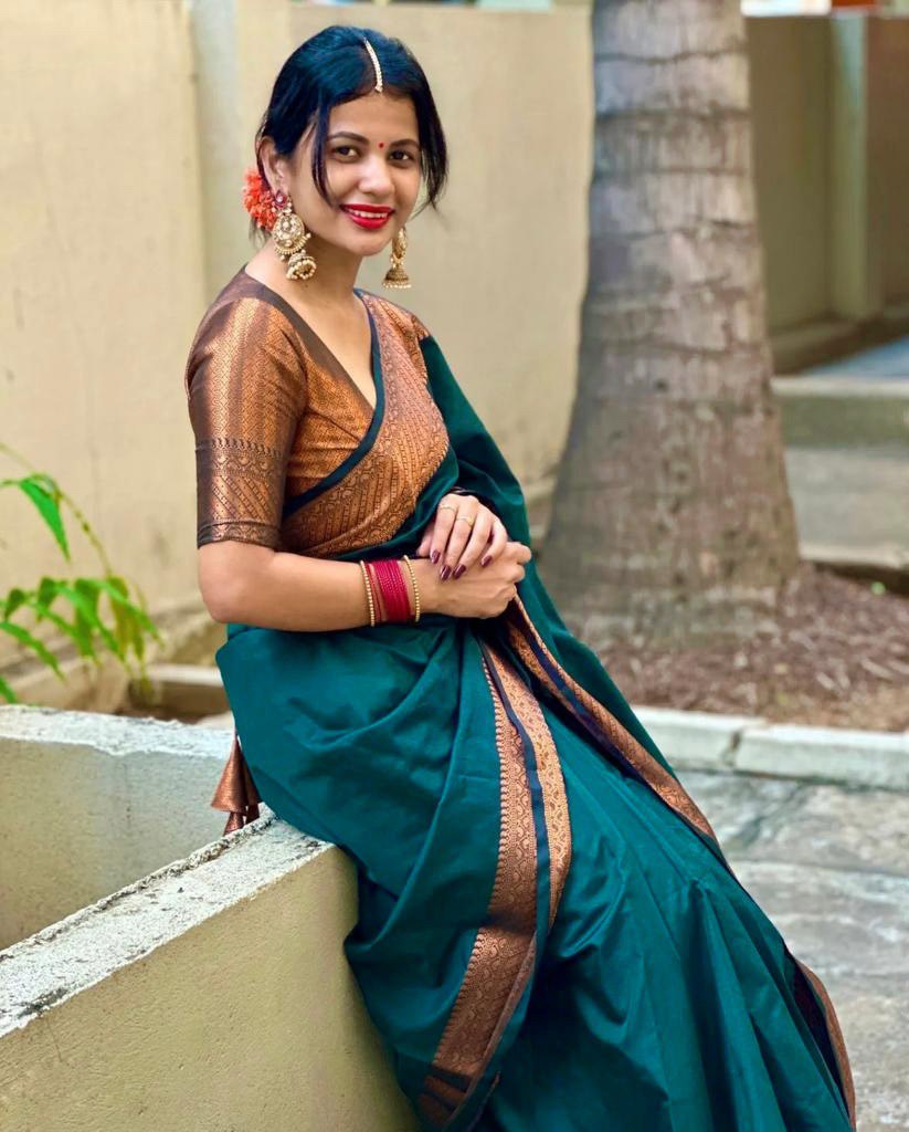 Exquisite Teal Blue Banarasi Silk Saree with Antique Copper Zari Border