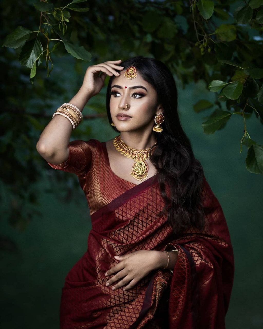 Regal Maroon Banarasi Silk Saree with Antique Gold Zari & Intricate Diamond Weave