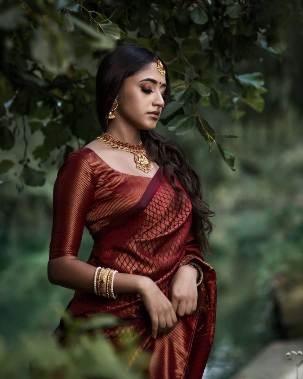 Regal Maroon Banarasi Silk Saree with Antique Gold Zari & Intricate Diamond Weave
