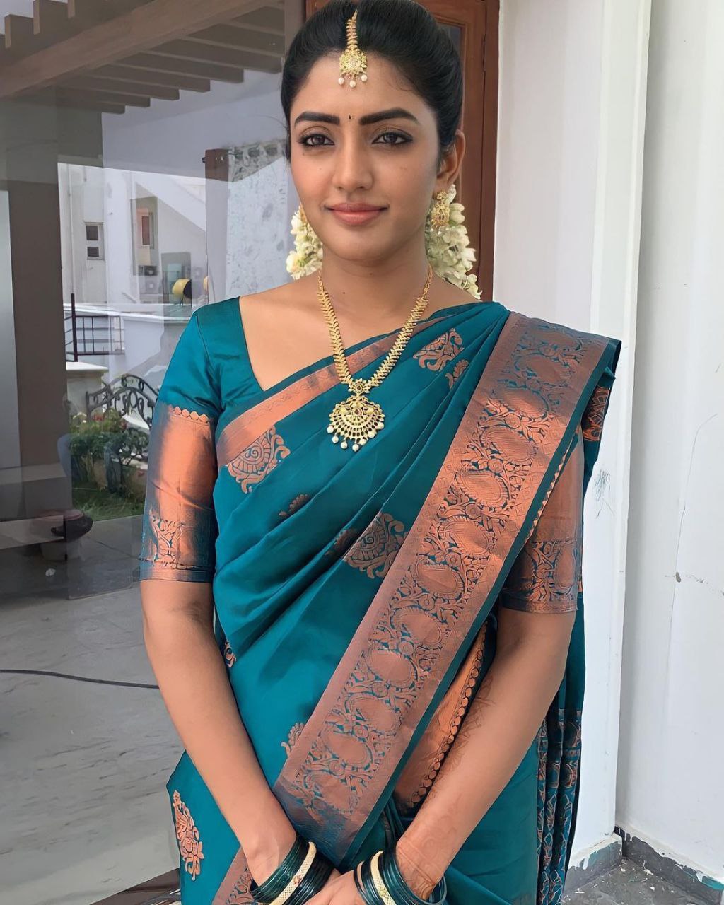 Timeless Elegance Peacock Blue Banarasi Silk Saree with Antique Copper Zari