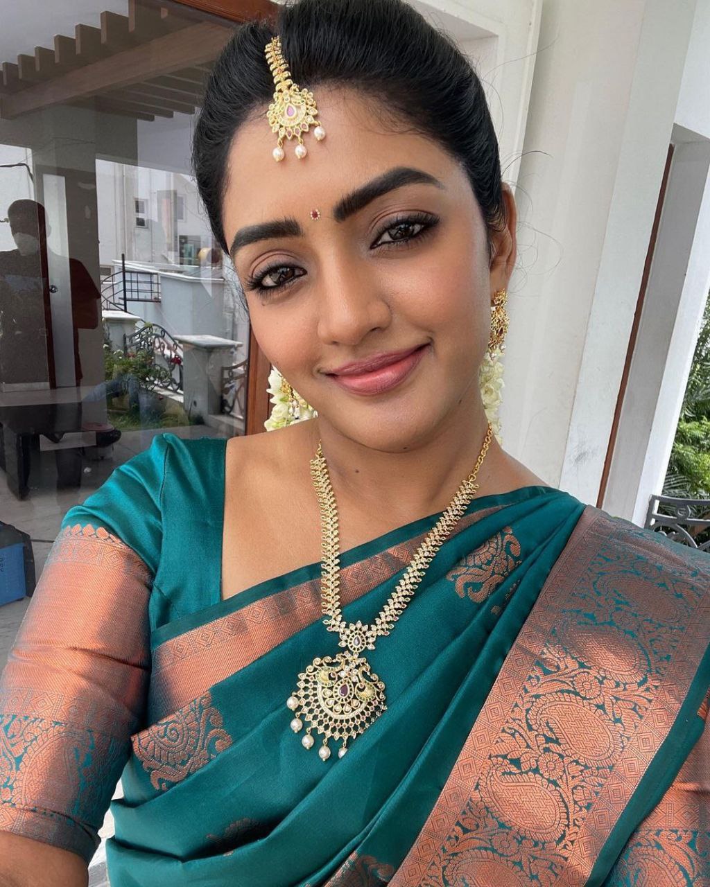 Timeless Elegance Peacock Blue Banarasi Silk Saree with Antique Copper Zari
