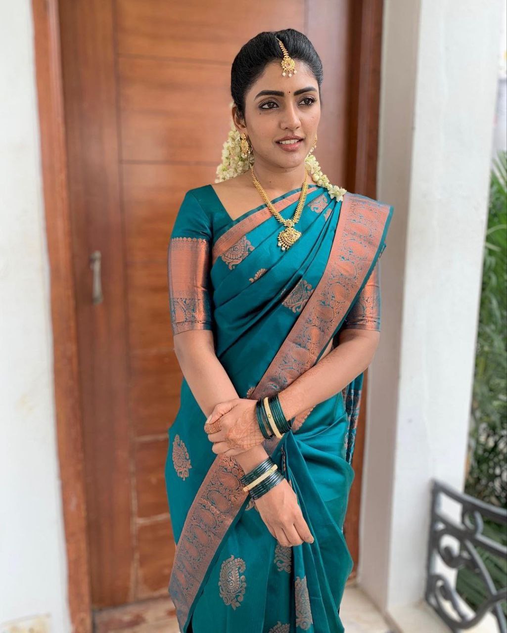 Timeless Elegance Peacock Blue Banarasi Silk Saree with Antique Copper Zari