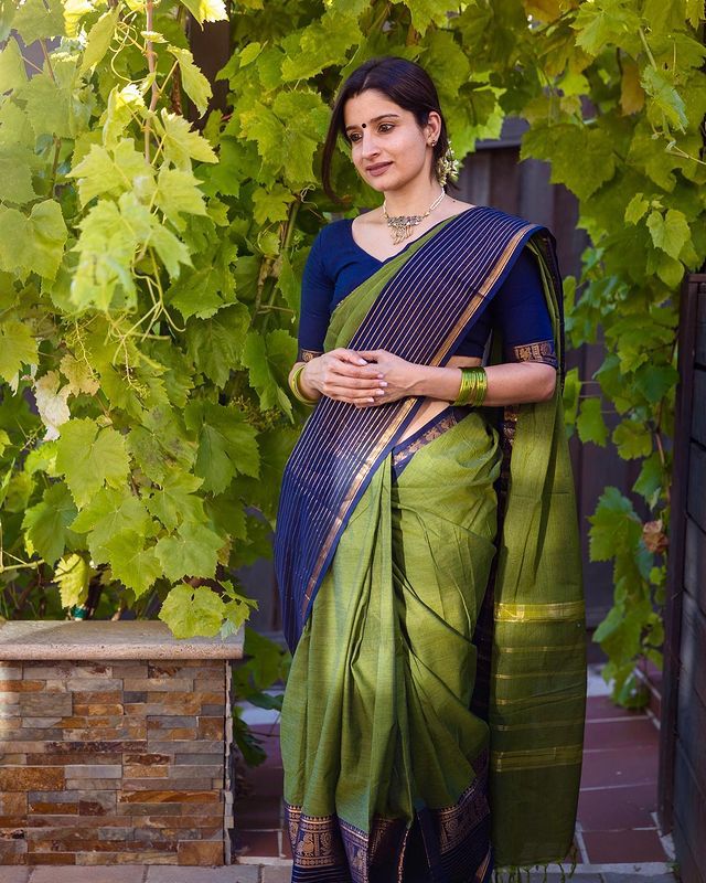 Moss Green Banarasi Silk Saree featuring Traditional Navy Borders