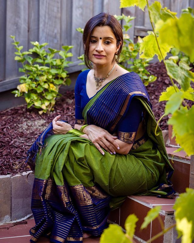 Moss Green Banarasi Silk Saree featuring Traditional Navy Borders