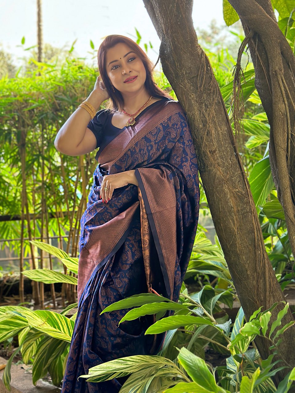 Indigo Copper Symphony: Handcrafted Banarasi Silk Saree