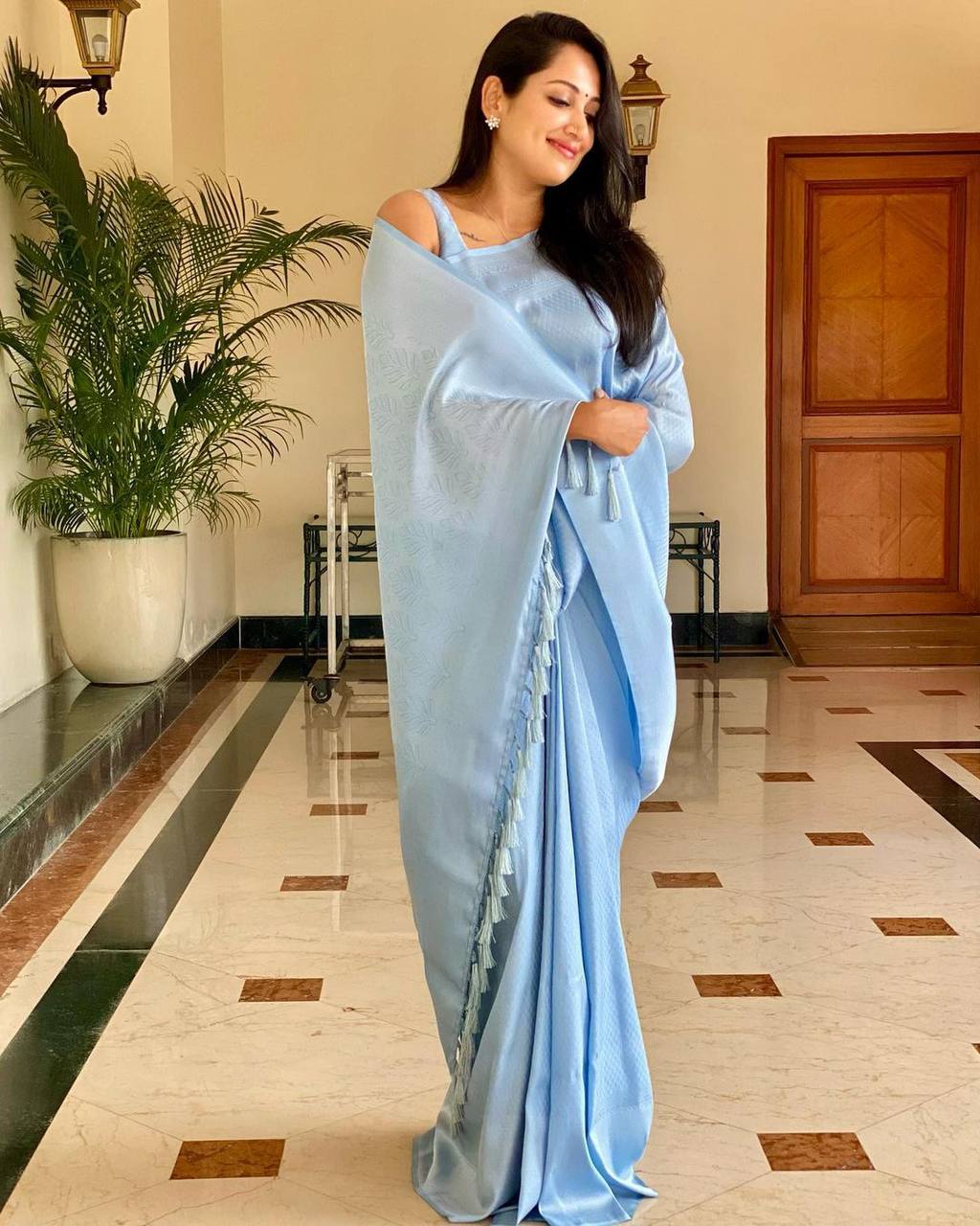 The Sky-Blue Modern Banarasi Silk Saree with Tassel Detail