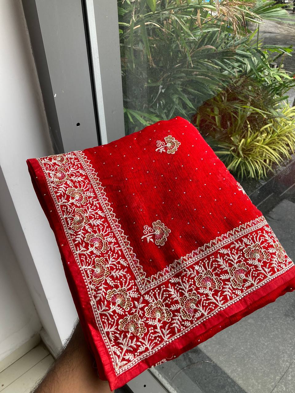 Radiant Crimson Georgette Saree with Intricate Silver Zari Embroidery