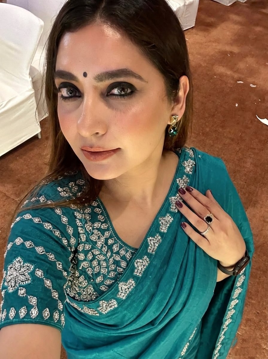 Teal Blue Silk-Blend Saree with Geometric Silver Zari Border and Heavy Embroidered Blouse Stitched